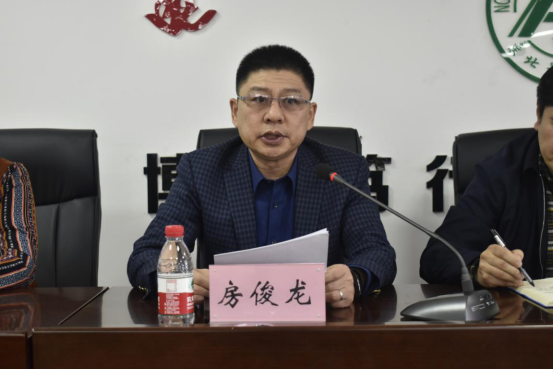 房俊龙作《红是一世手机版足球网2020年行政工作报告》